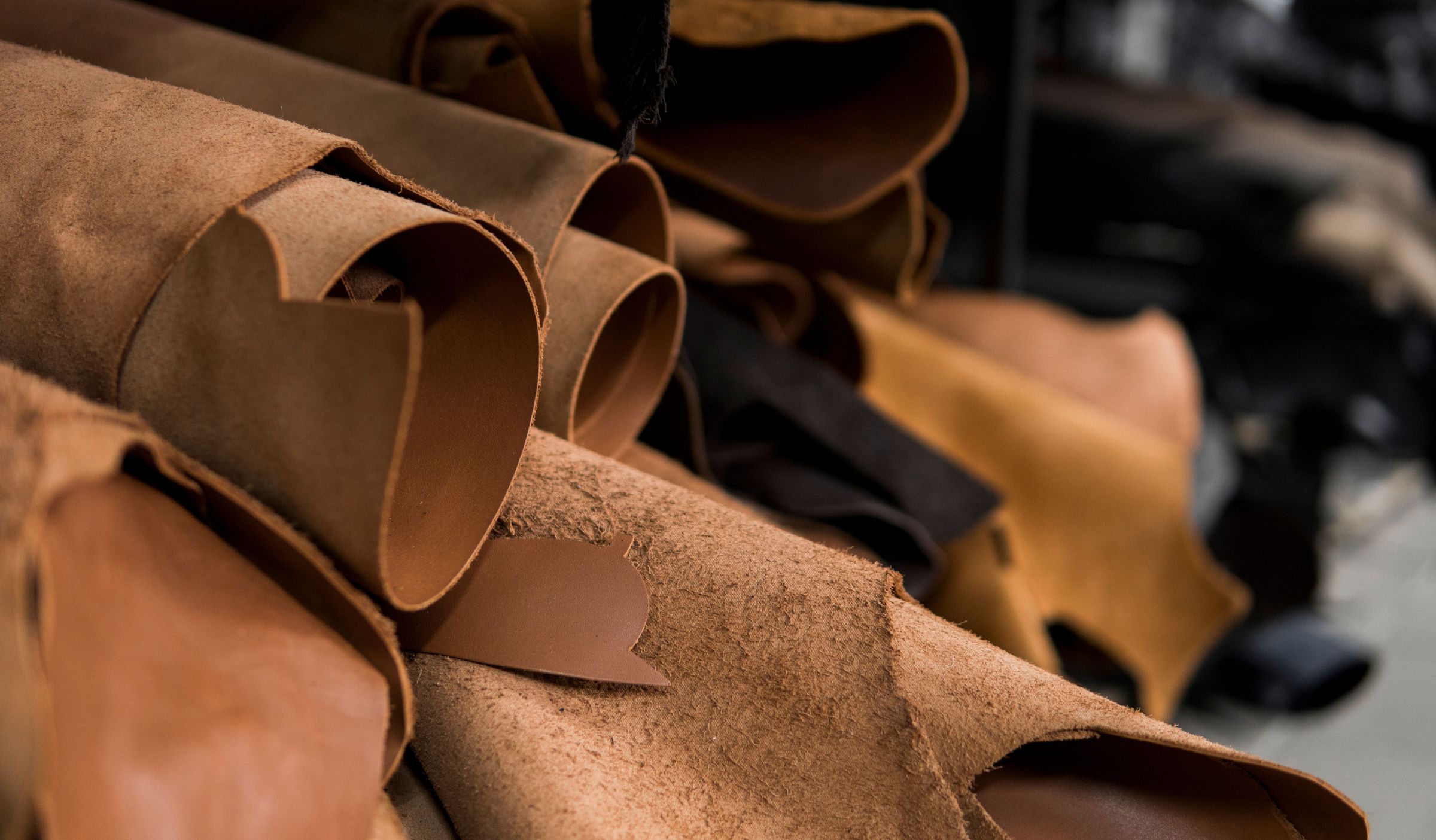 Range of different leather hides in tannery.