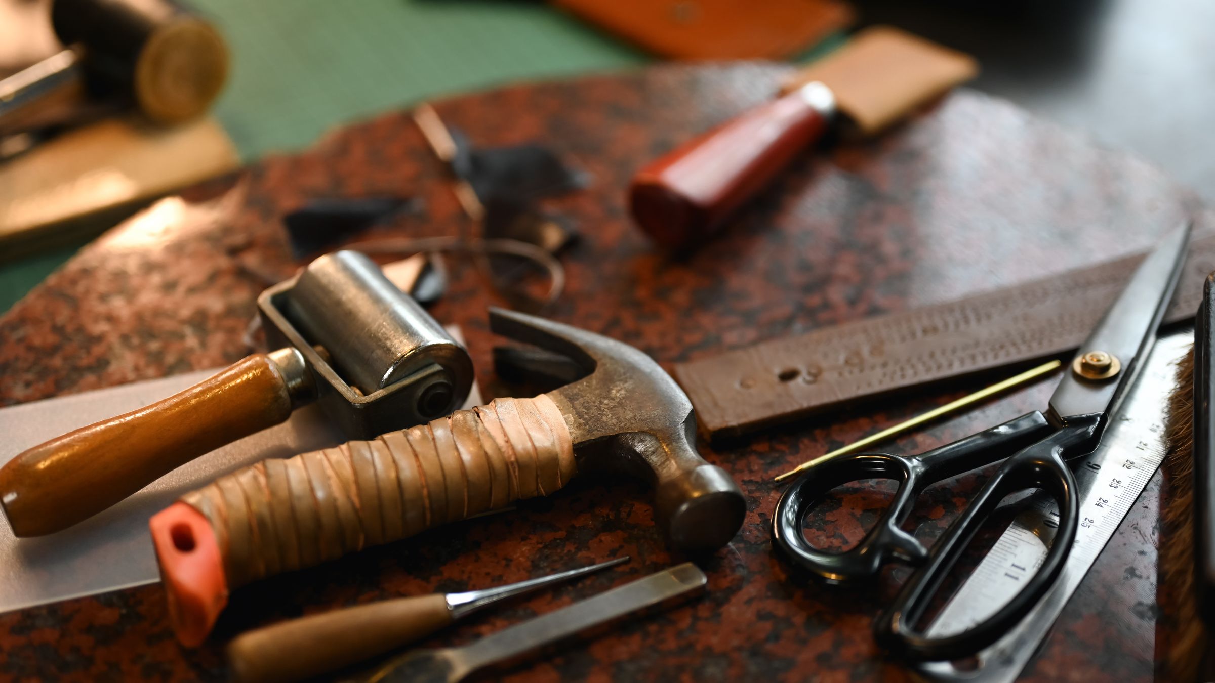 Range of shoe tools including a knife, scissors and more.